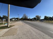 View from outside the apartment looking toward railroad crossing.