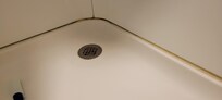 Shower is smaller than a cruise ship shower and not cleaned well. There is also no place in the bathroom to hang towels to dry