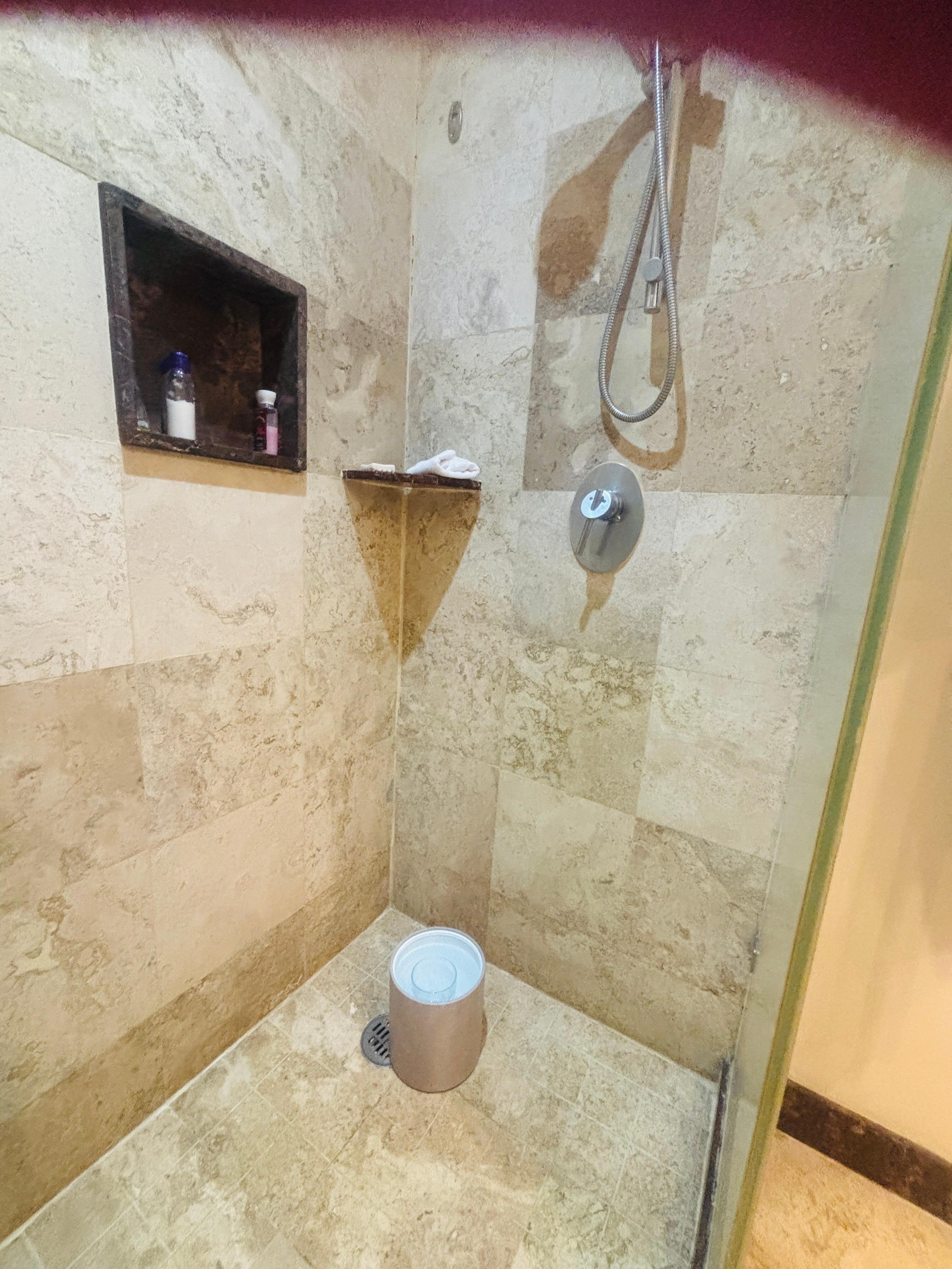 Third World country problem… Having to get hot water from the sink to take a comfortable shower because it was not hot enough