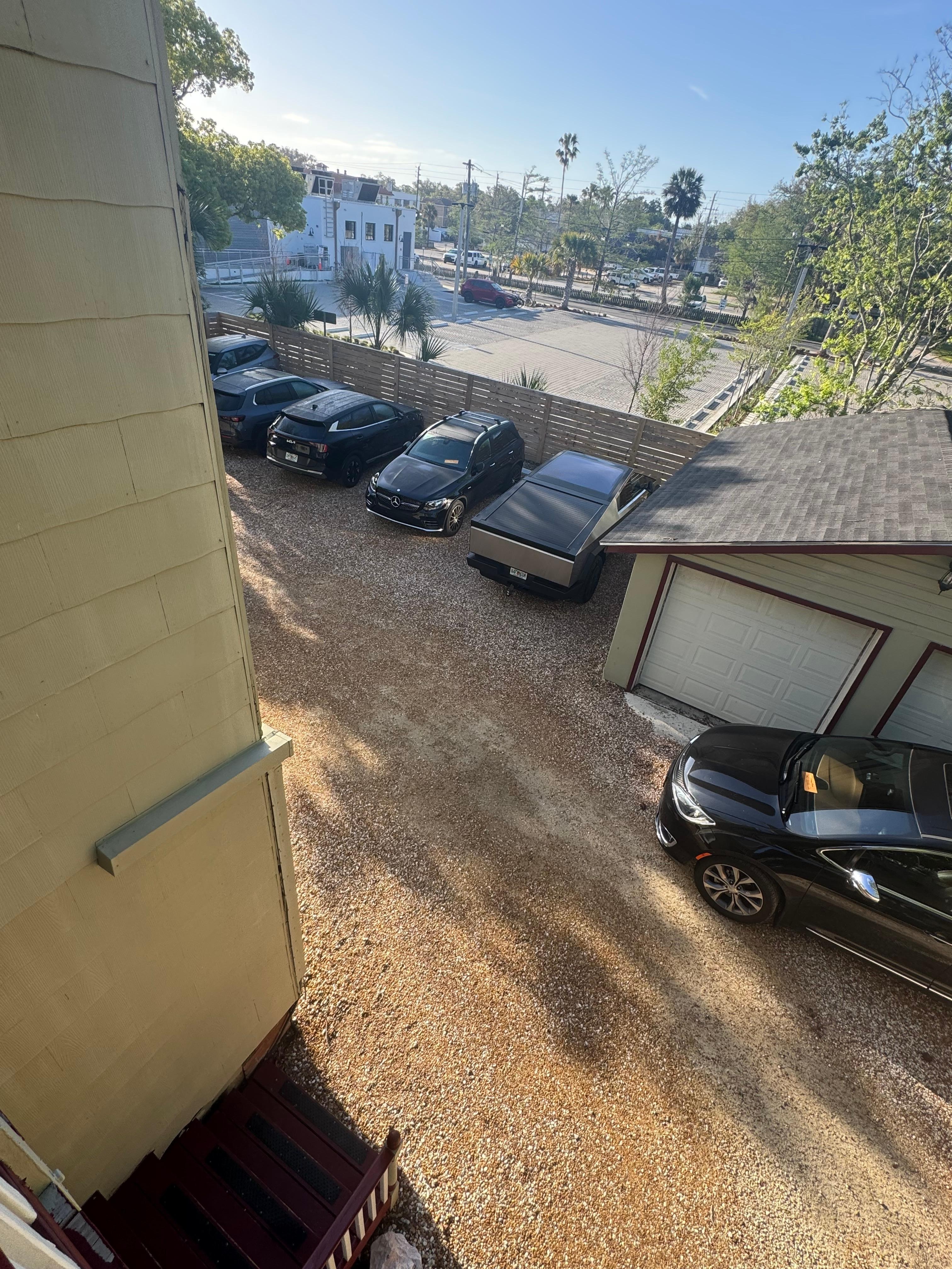 Private and secure parking lot  behind the house