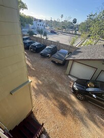 Private and secure parking lot behind the house