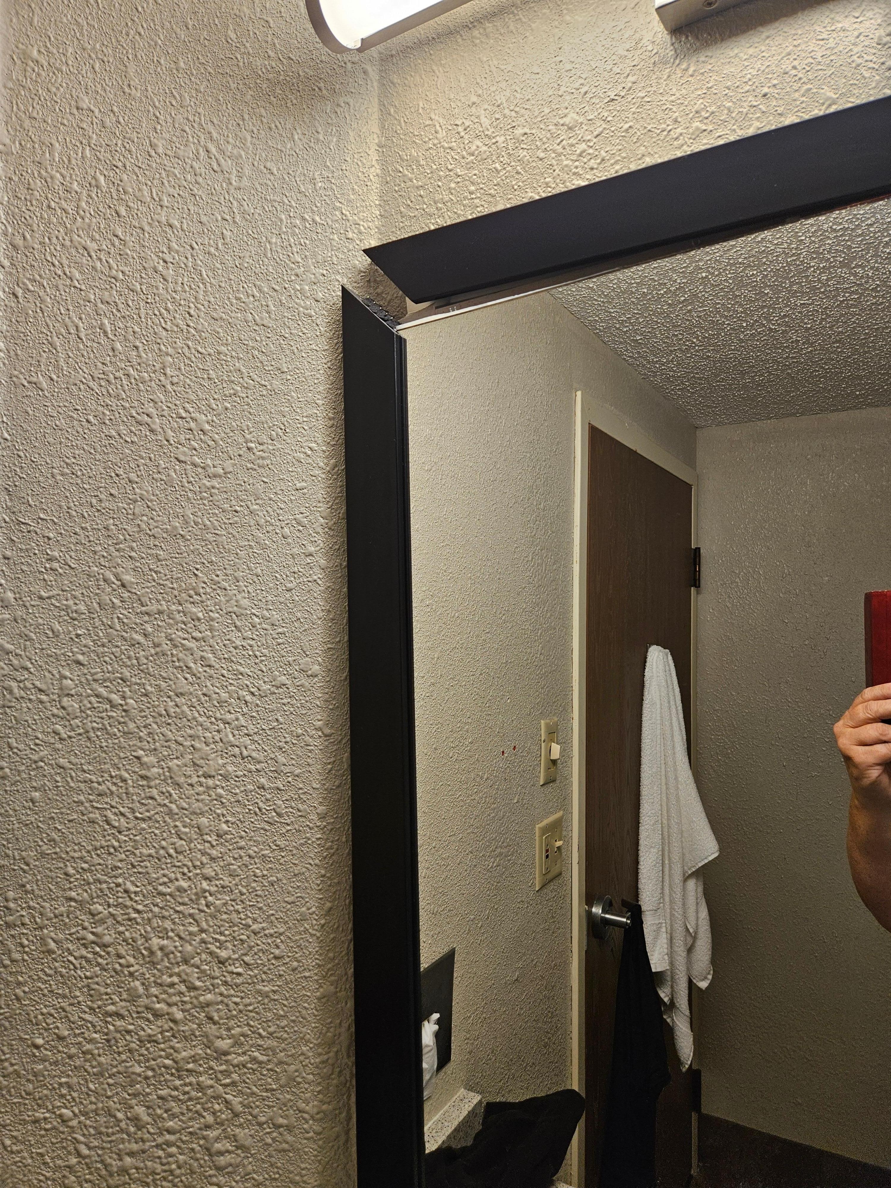 Upper left corner of the frame falling apart. 