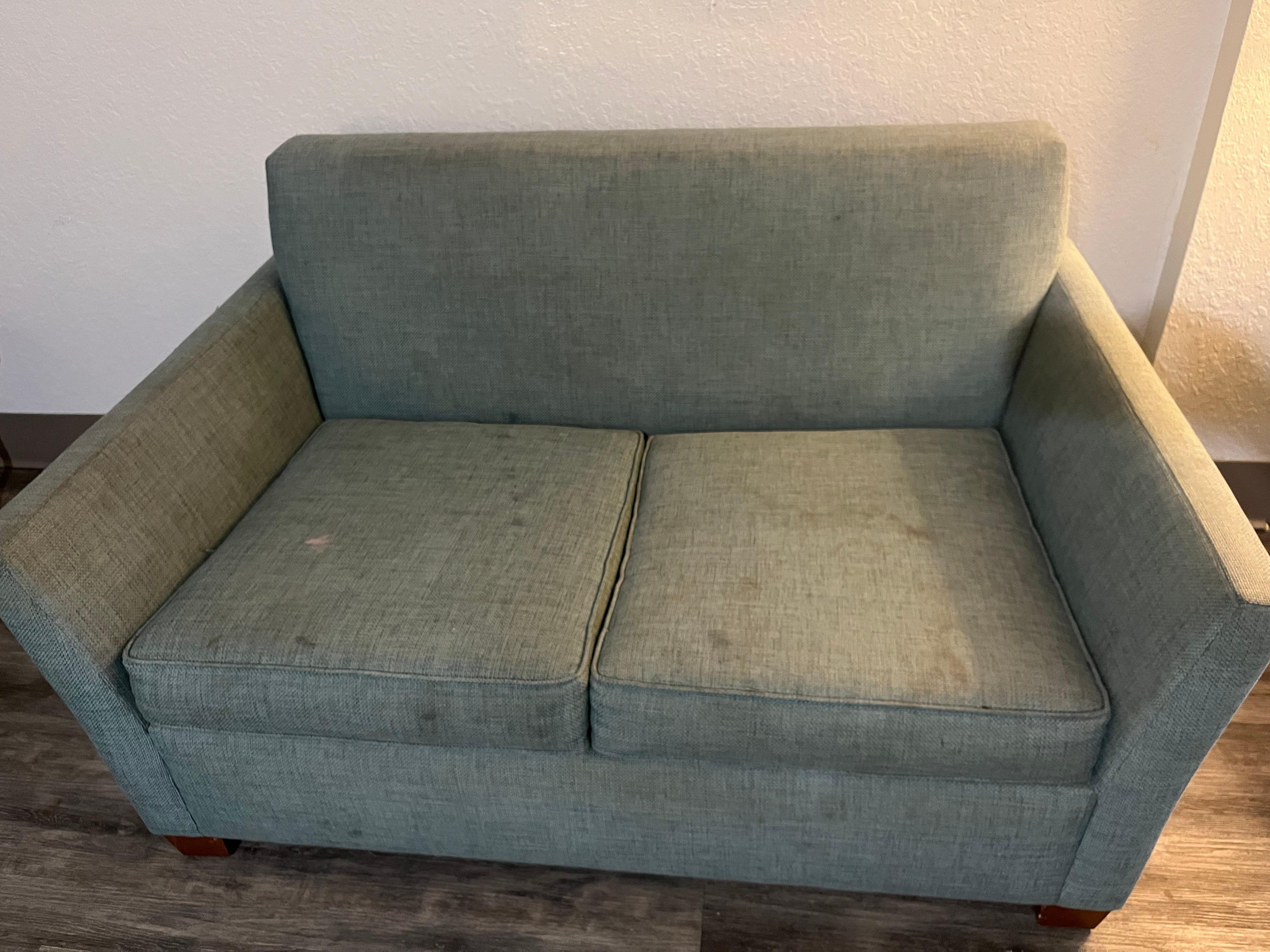This was the couch in my home. It was very dirty I was scared to seat down on it