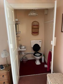 En-suite toilet in a cupboard