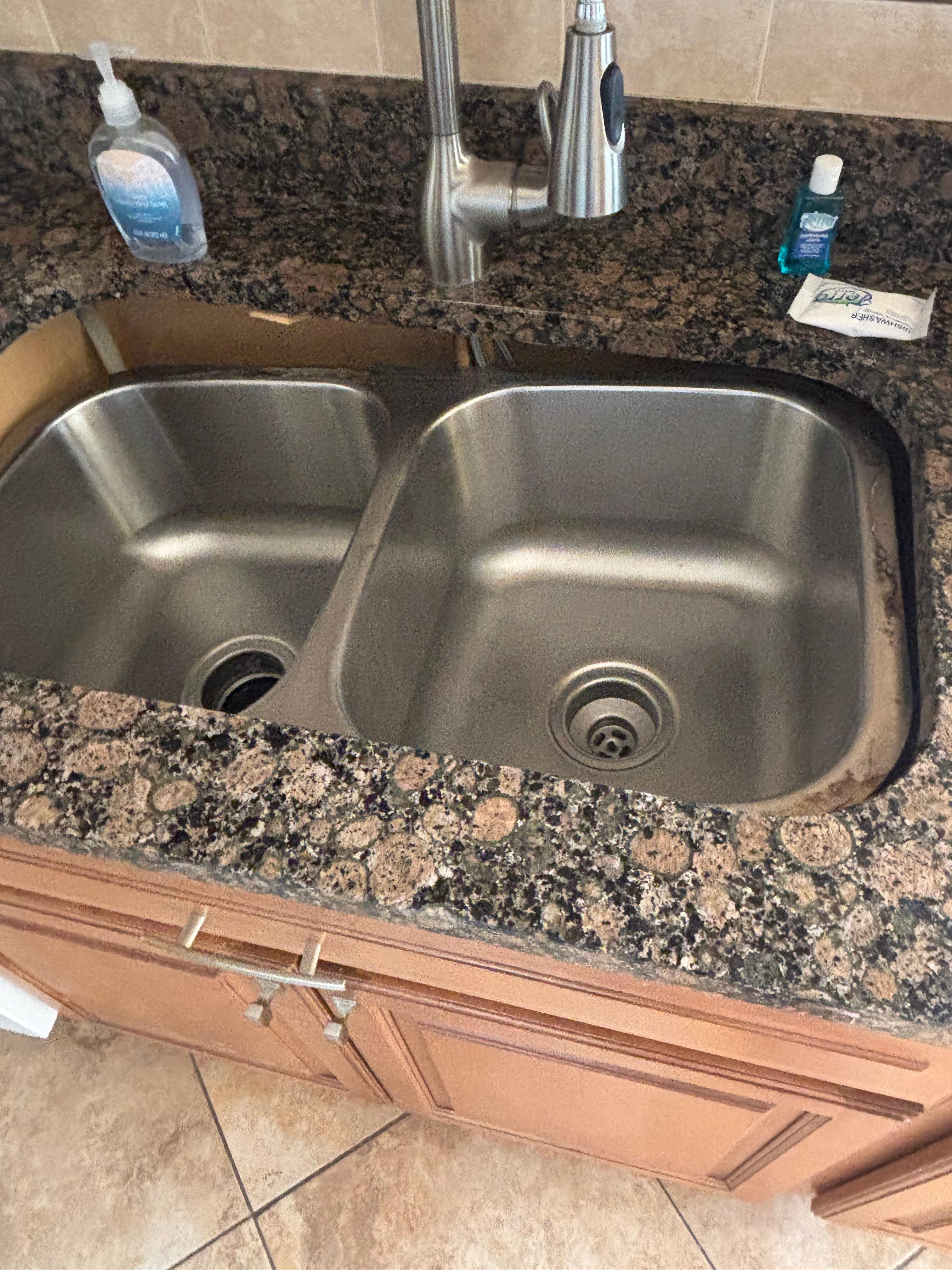 Kitchen sink is falling into the cabinet 