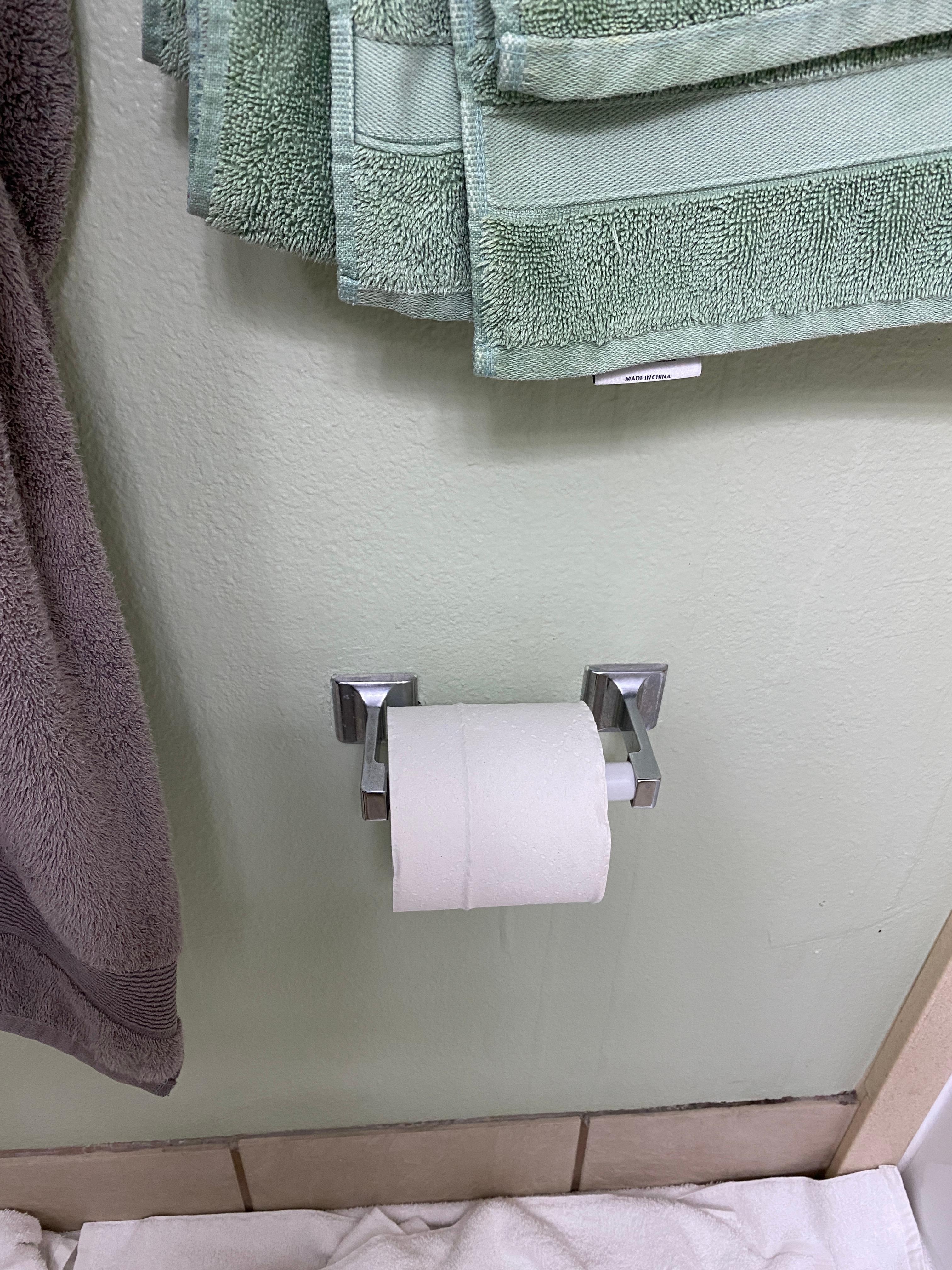 Bathroom- Black stuff above tile