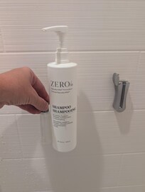 A comparison of the bottle sizes that are all empty to when you call down to get them refilled and they hang you a travel size for your family if 6 to use.