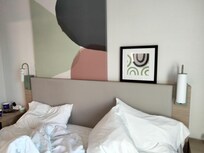 Lamp shade missing on left.