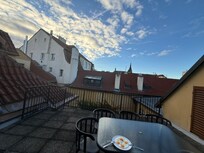 Comes with a large rooftop balcony