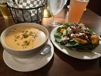 Lobster bisque, salad, and local brew