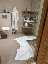 Wet towels to dry up the floor after every shower.