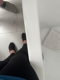 I struggled getting in and out of the shower. It came to above my knees. I am roughly 5'2.
