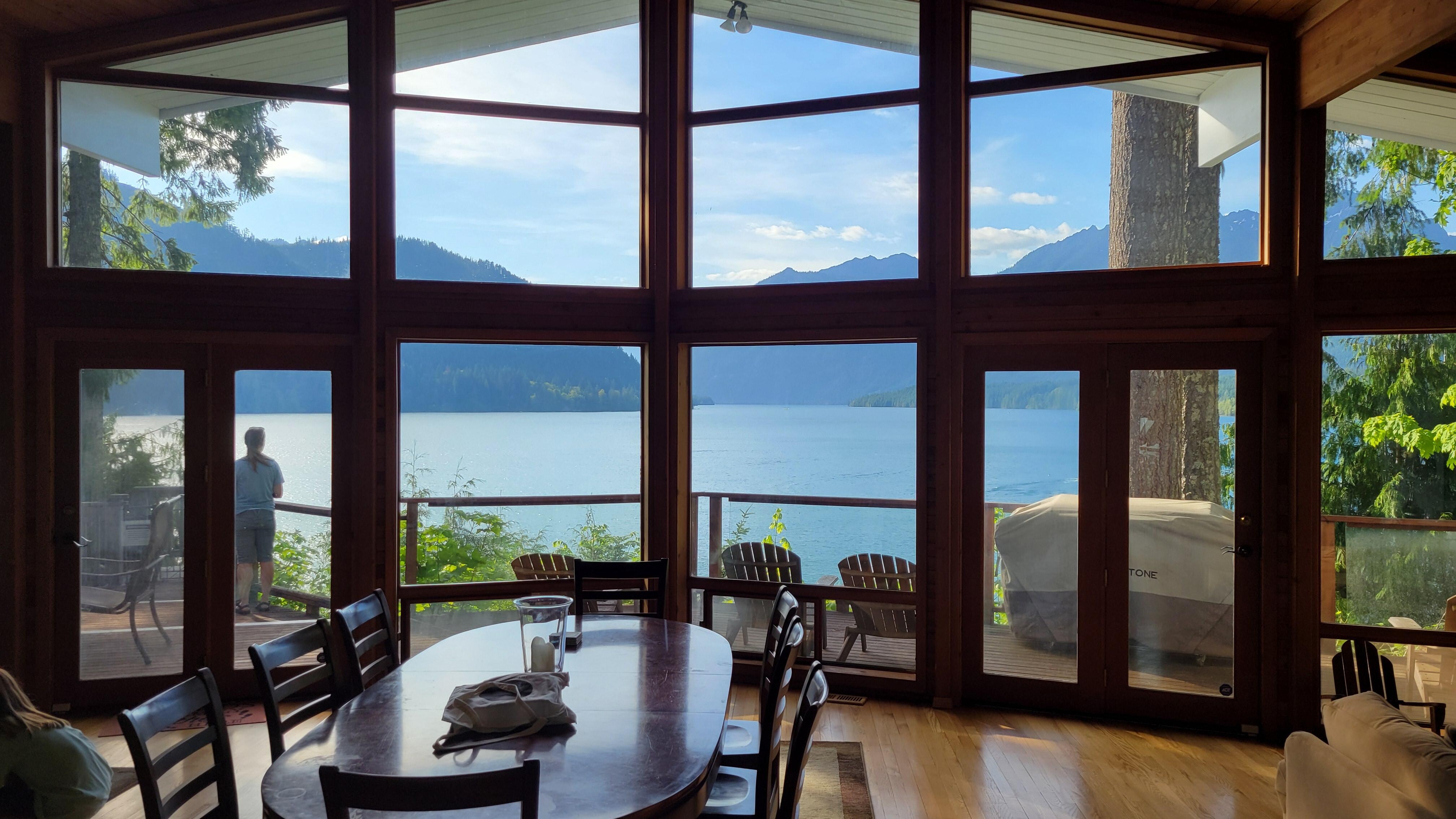 Living room with large windows to enjoy the view. 