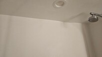 Wall near shower head
