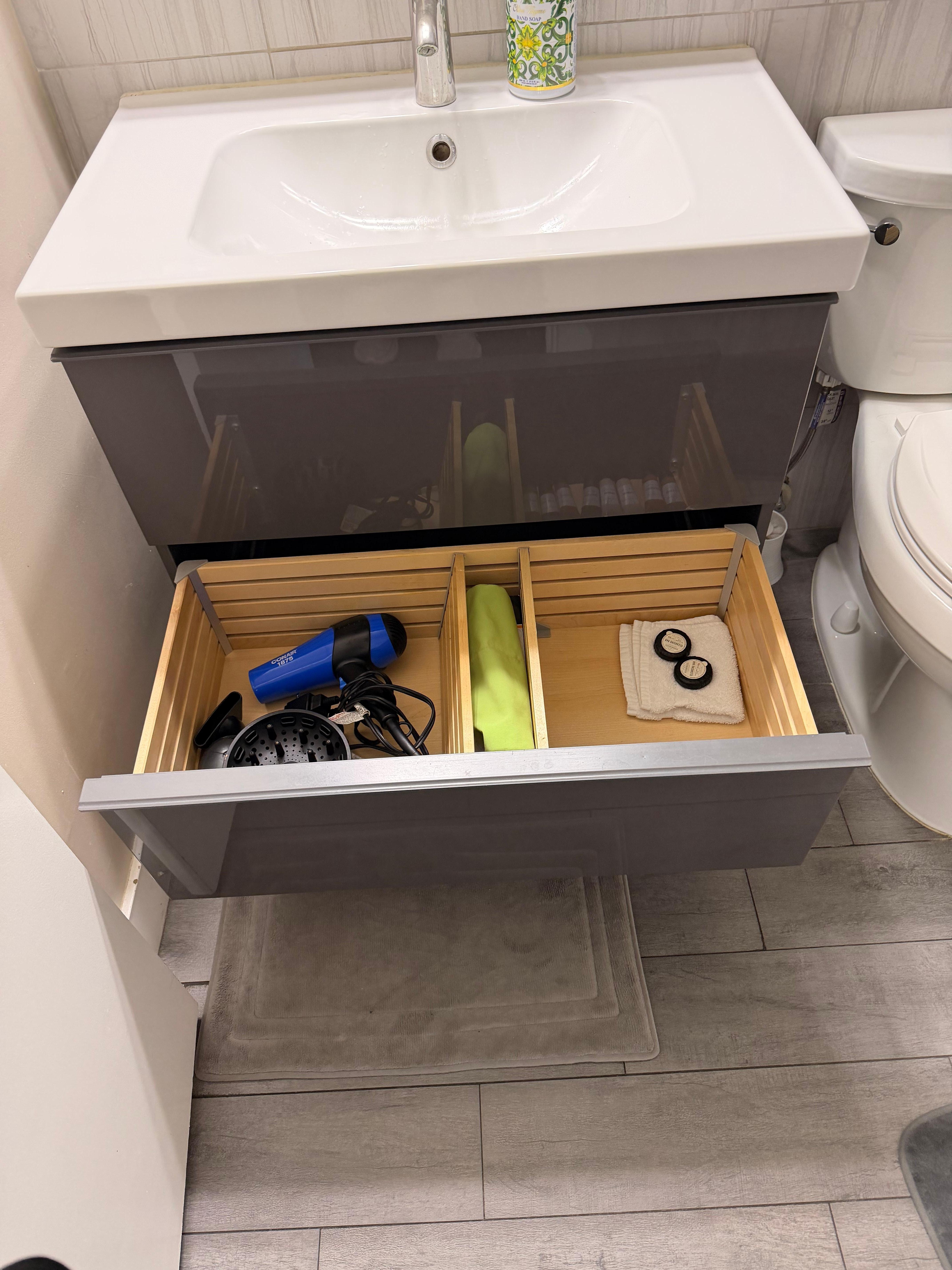 Two nice drawers with hair dryers, soap, lotion. 