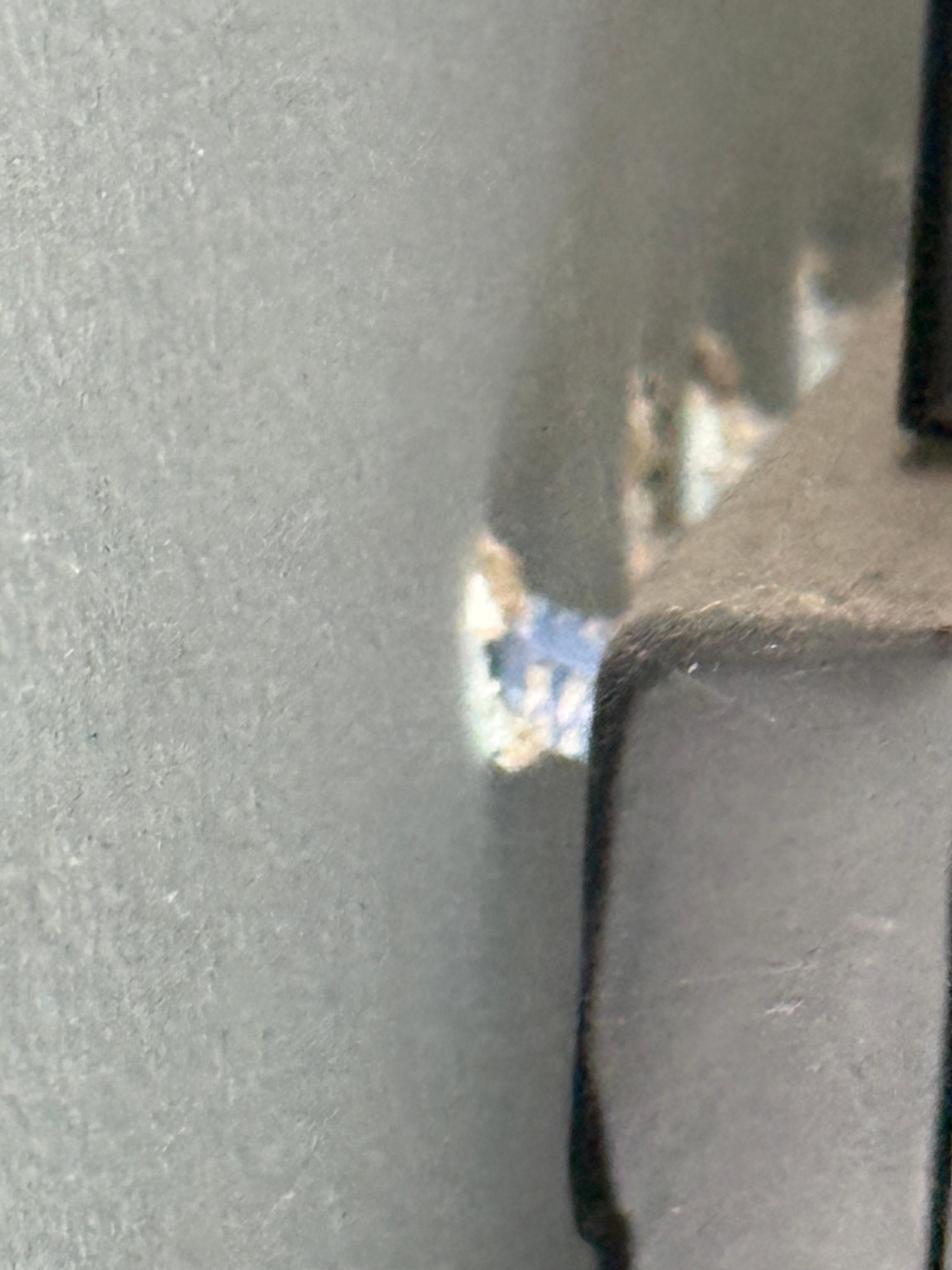 Living room TV hanging off of wall