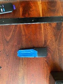 tv remote- batteries held in with blue tape; could not adjust volume or turn off the TV