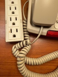 Old food all on the phone cord and electric plug