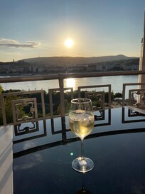 Enjoying the thoughtful & delicious complimentary wine.