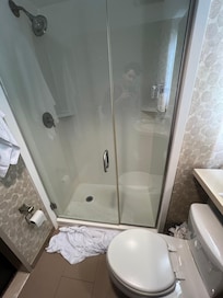 Sagging door and old seals resulting in shower door not closing and leaking