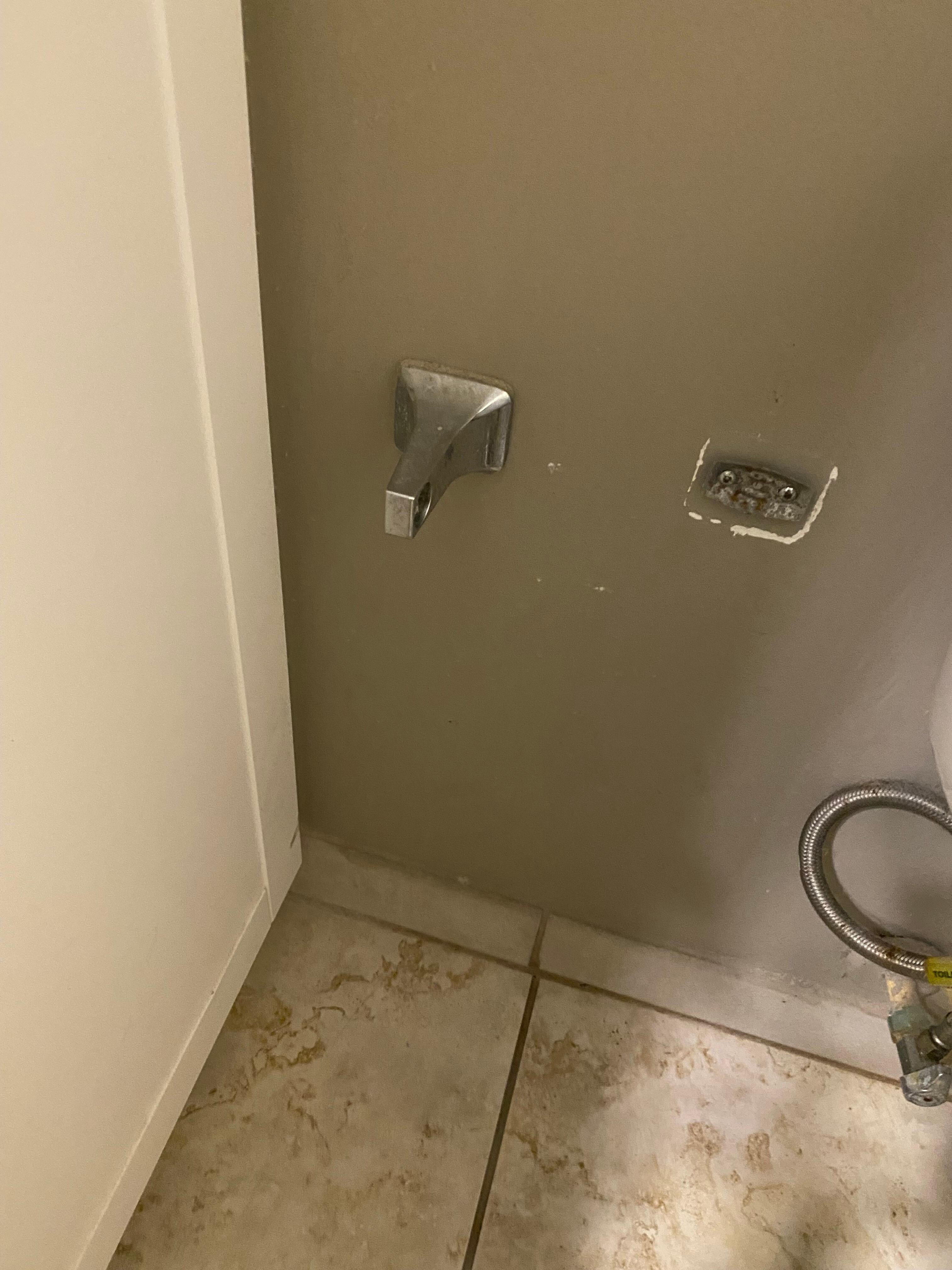 Broken toilet paper holder