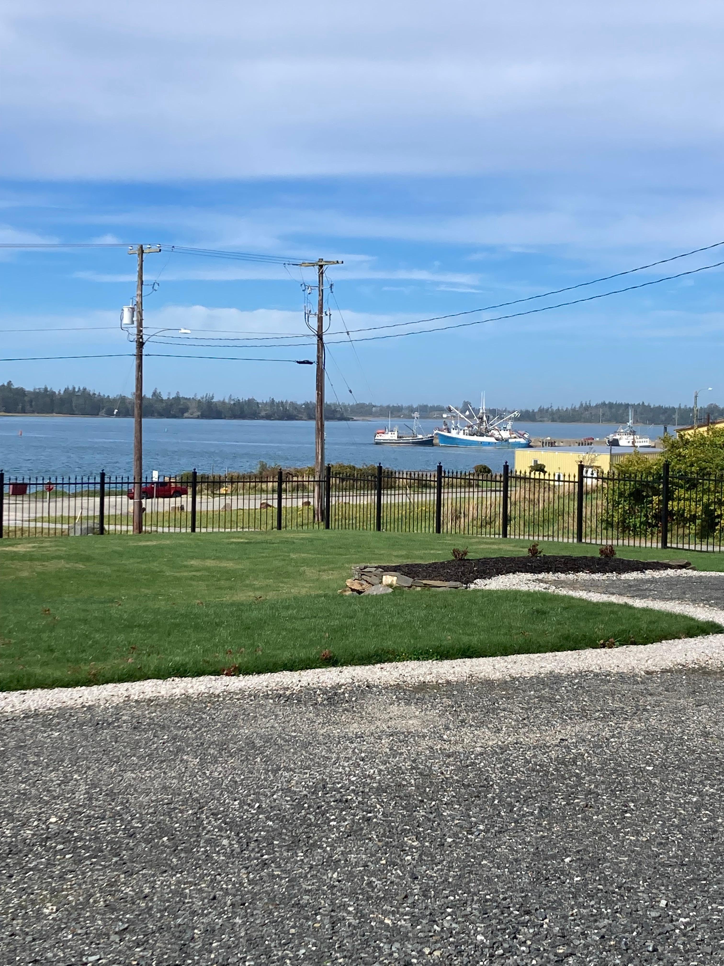 View from outdoor seating area at back of condo. 