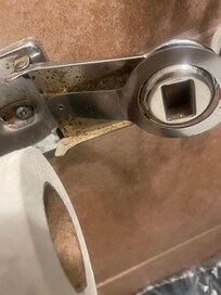 Dirty toilet roll holder briken