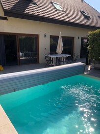Swimming pool and house