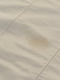 Different blood stains on the mattress cover