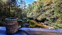 Morning coffee from upper balcony looking up river