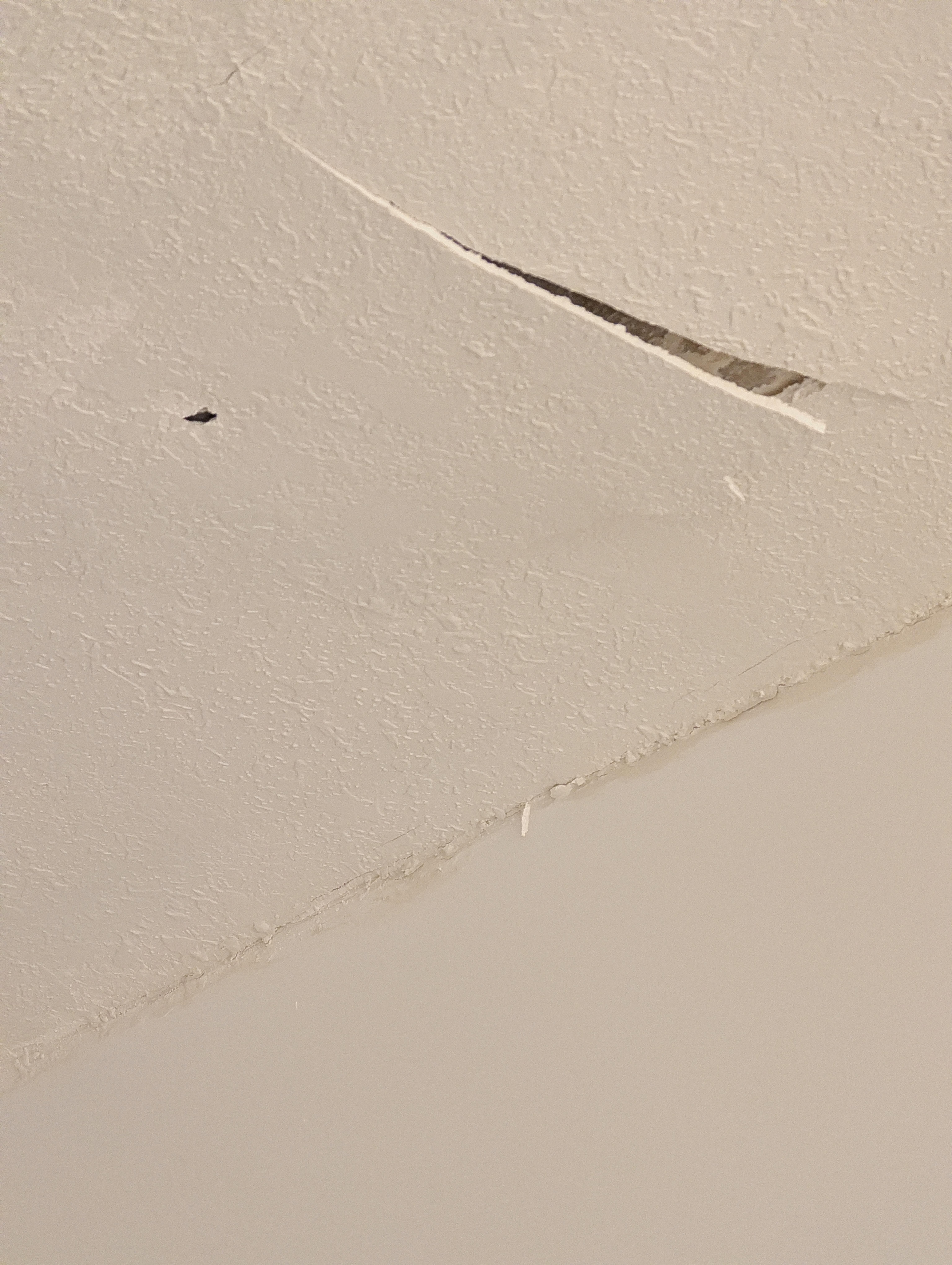 Ceiling above bathtub