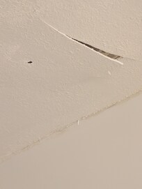 Ceiling above bathtub