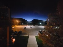 View from the inside stairwell, looking out the front at dusk