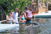 The Dolphin Splash lets you stand on a platform since our toddlers don't swim yet.