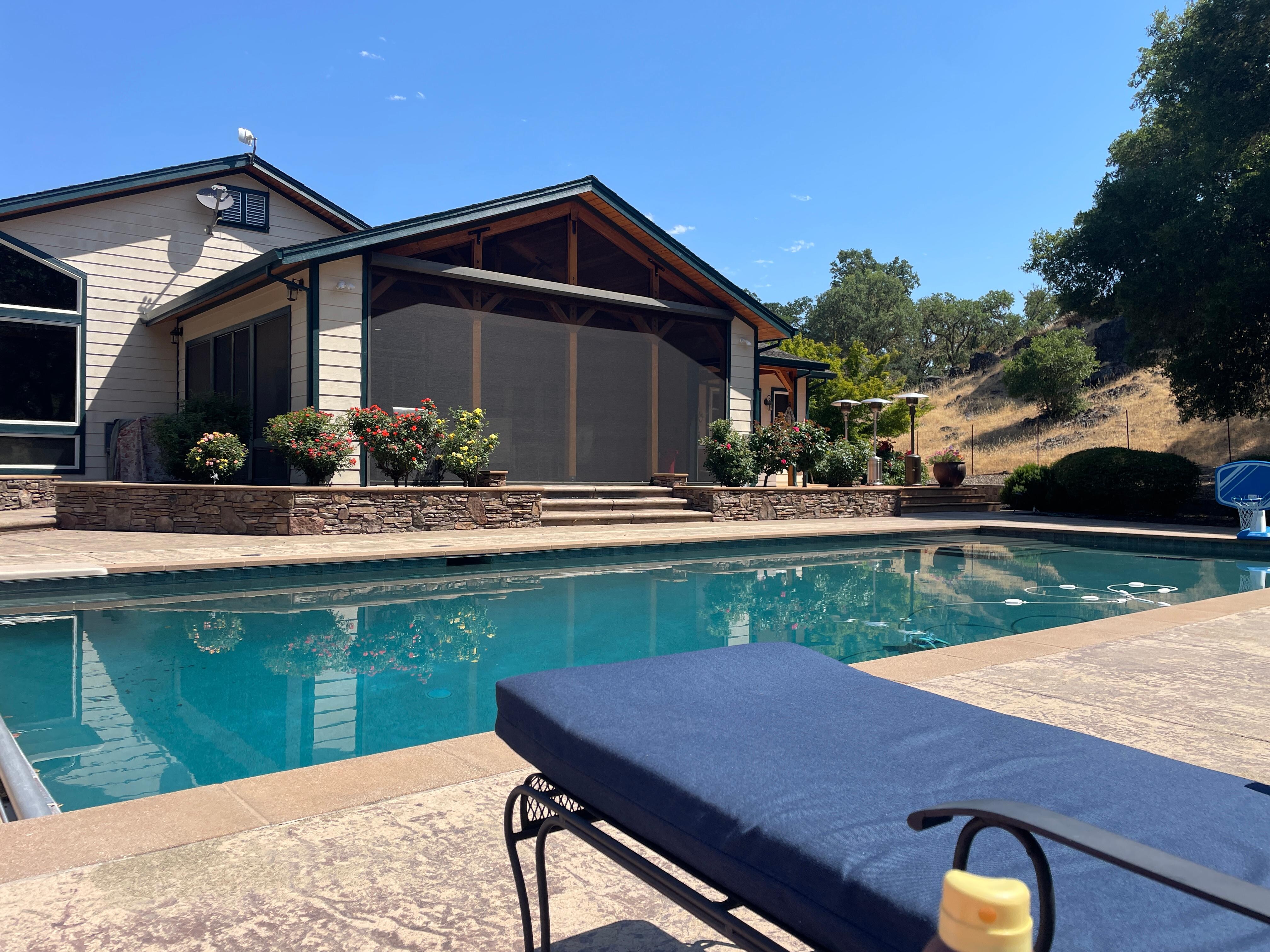 Back of house view, poolside 