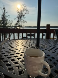 Good morning —coffee on the balcony overlooking the lake.