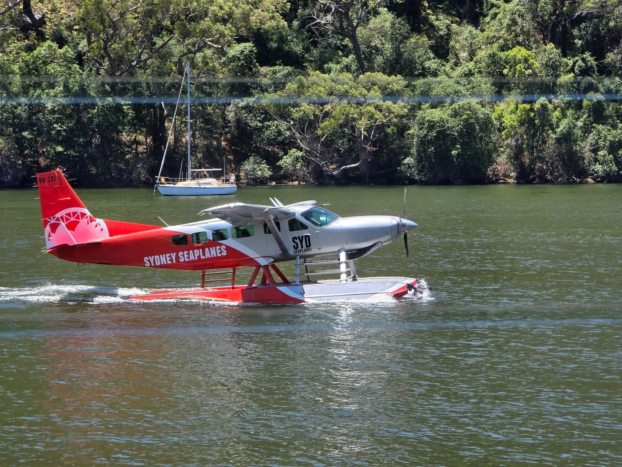 Plane arriving at Berowra Waters Inn