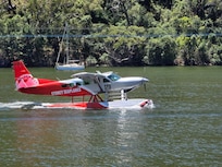 Plane arriving at Berowra Waters Inn