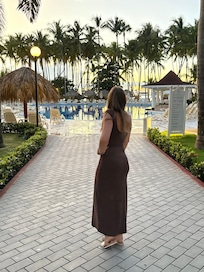 The view from a walkway looking towards the pool and beach