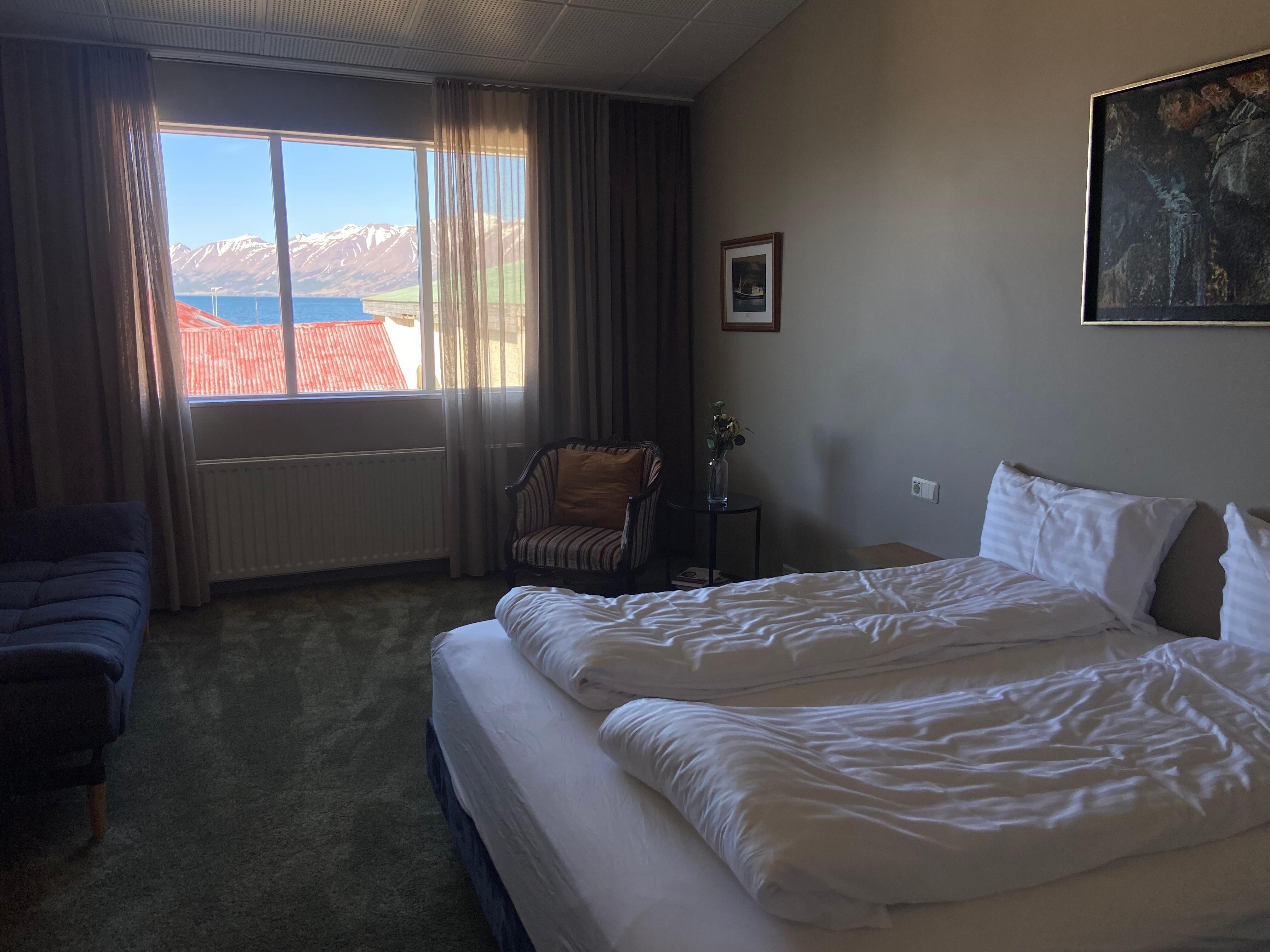 Room with sitting area and window