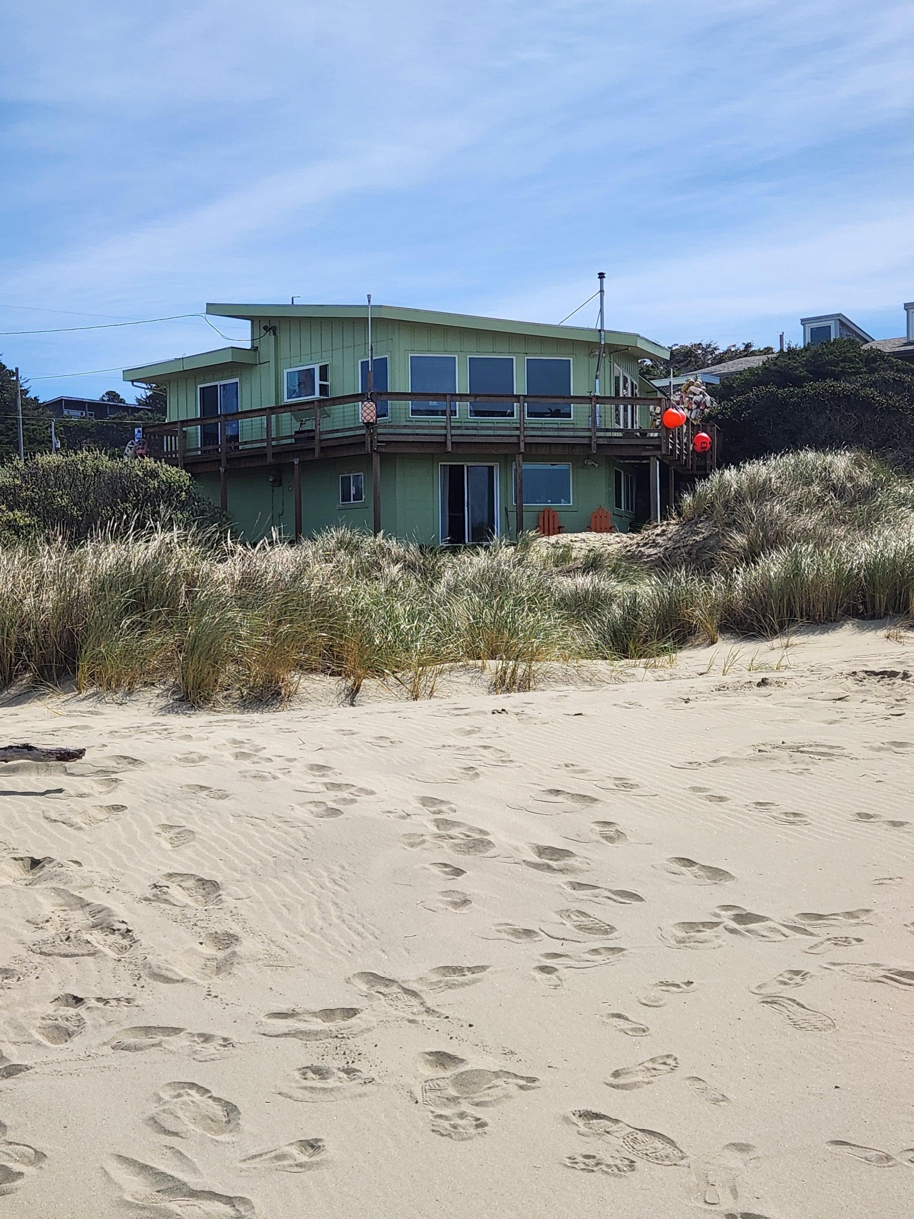 The rental is the bottom apartment.