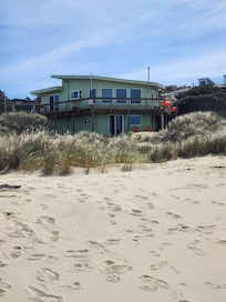 The rental is the bottom apartment.