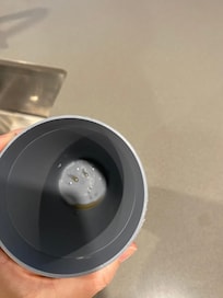 Dirty cup in cabinet