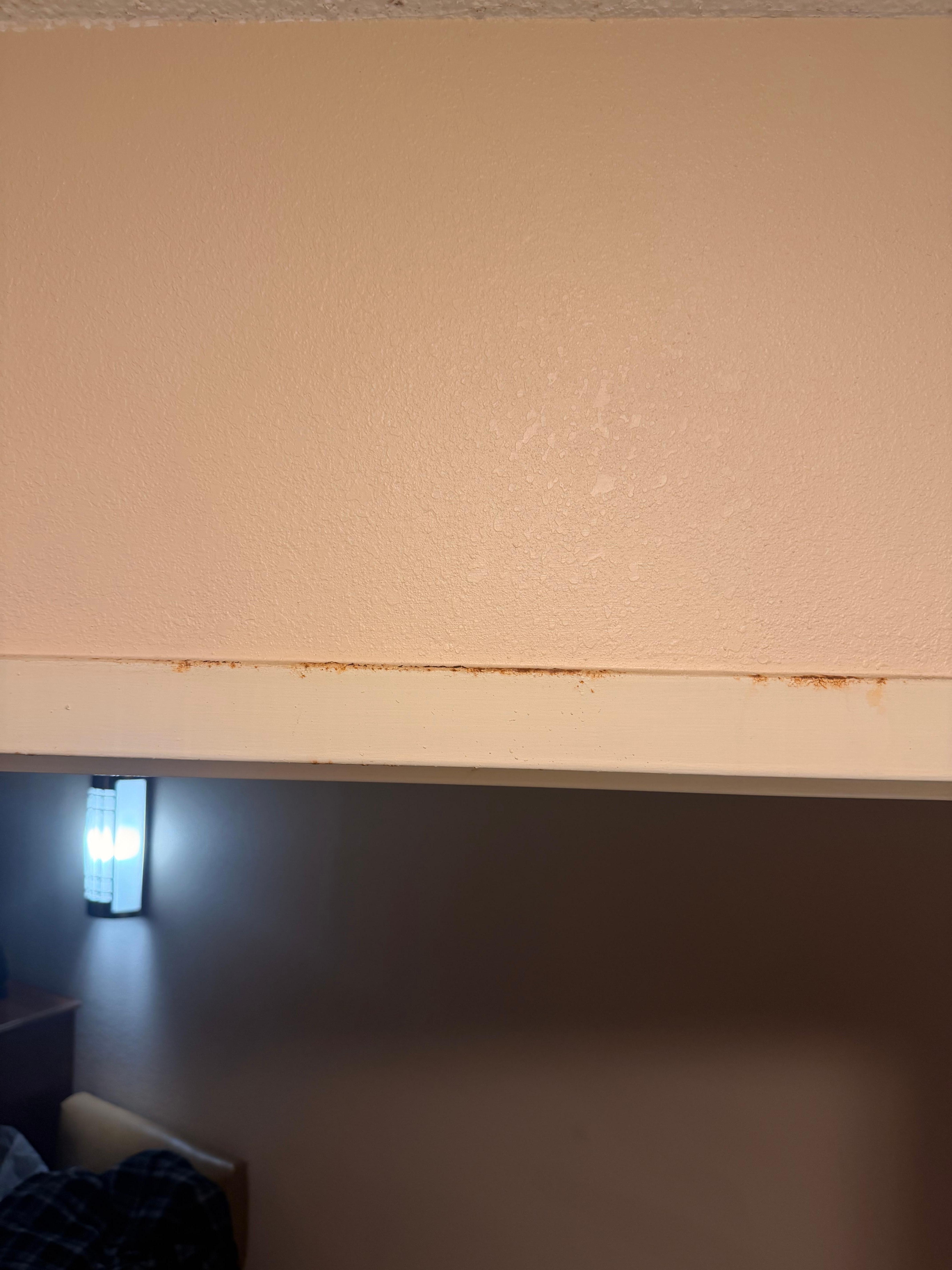 top of bathroom door. 