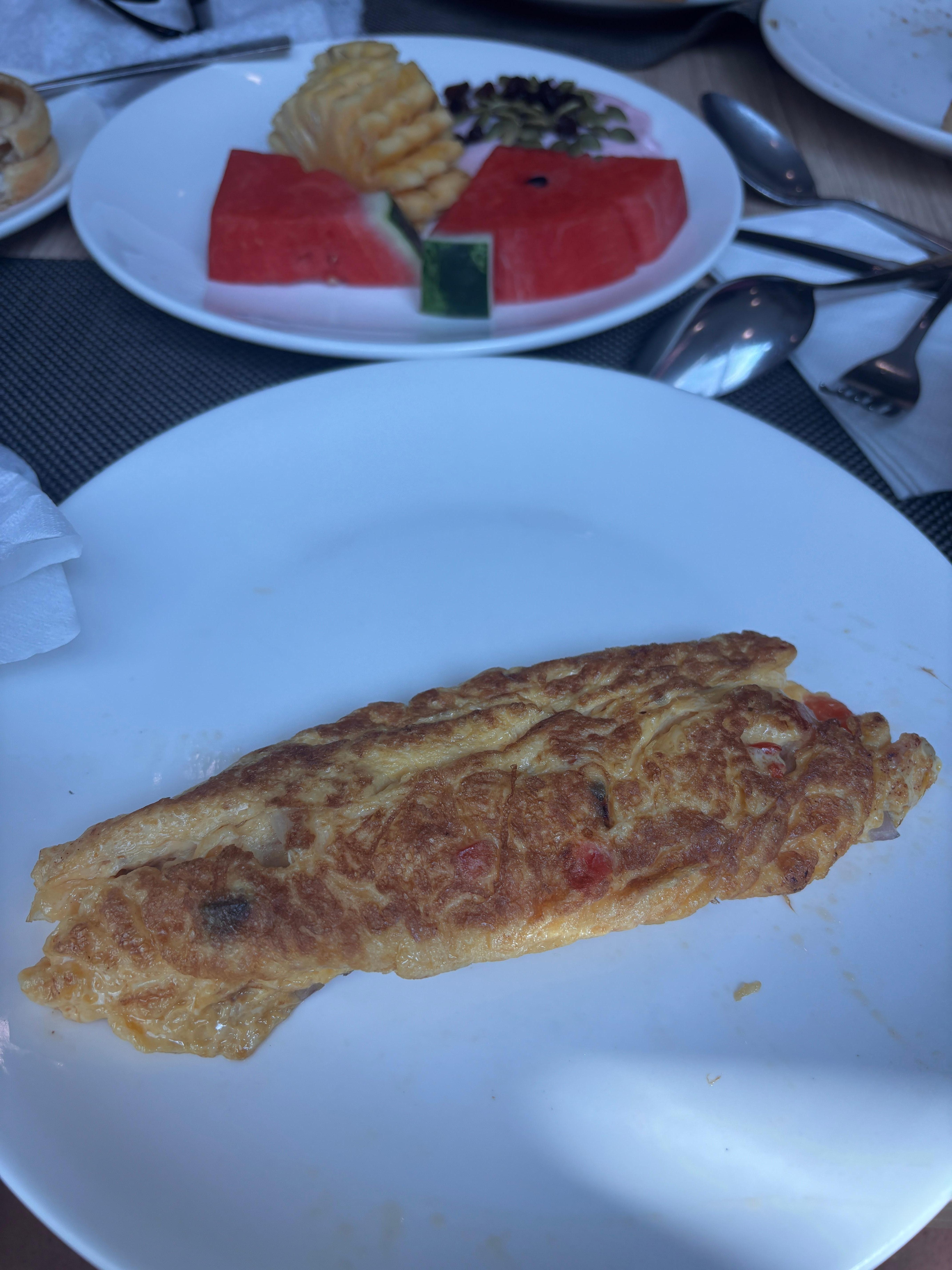 Pineapple dried out omelette runny in the middle sent it back to be cooked twice 