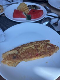 Pineapple dried out omelette runny in the middle sent it back to be cooked twice