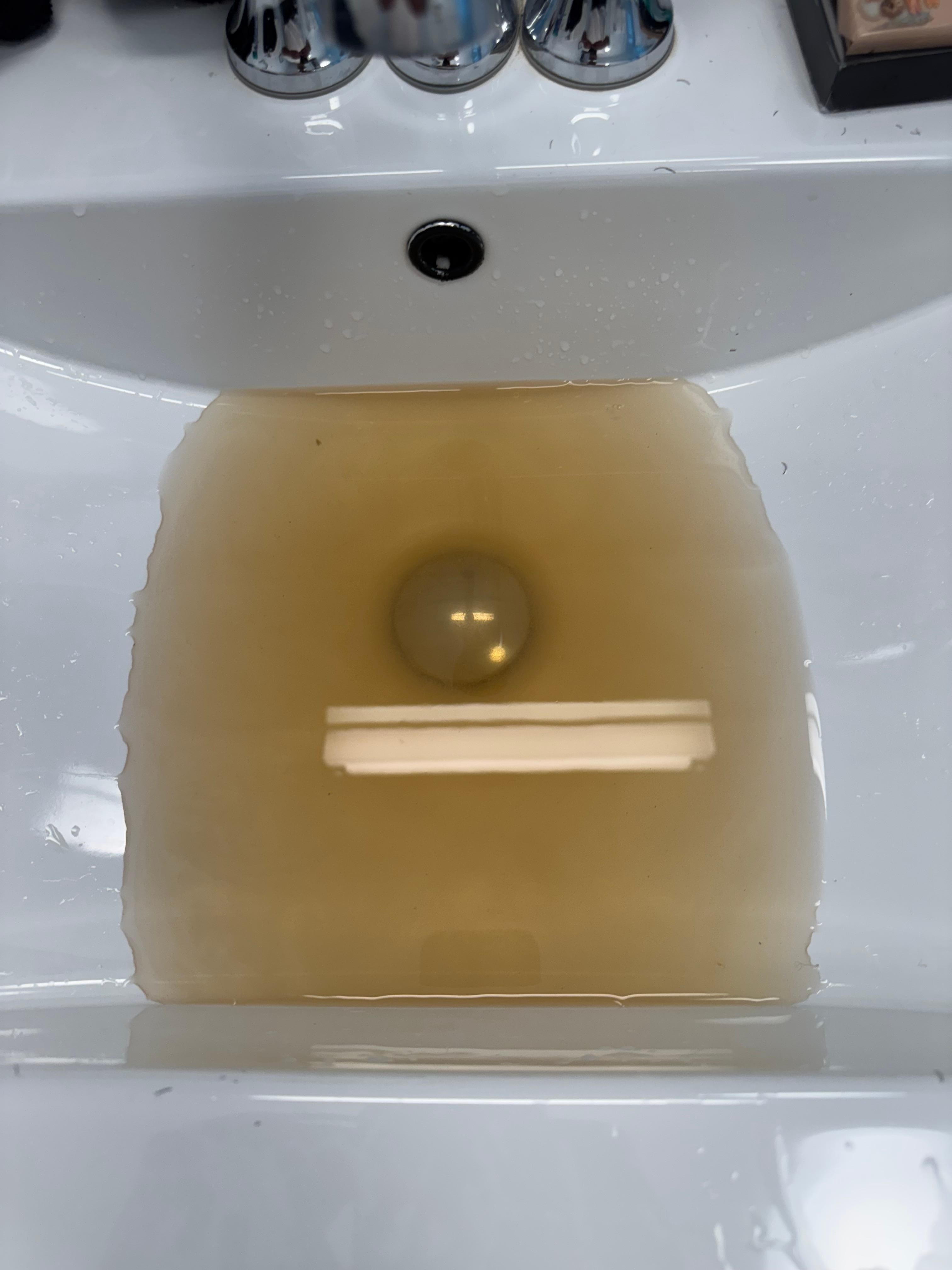 This was our water in our sink. We were told just to let it run it would get better. They were no help at all. 