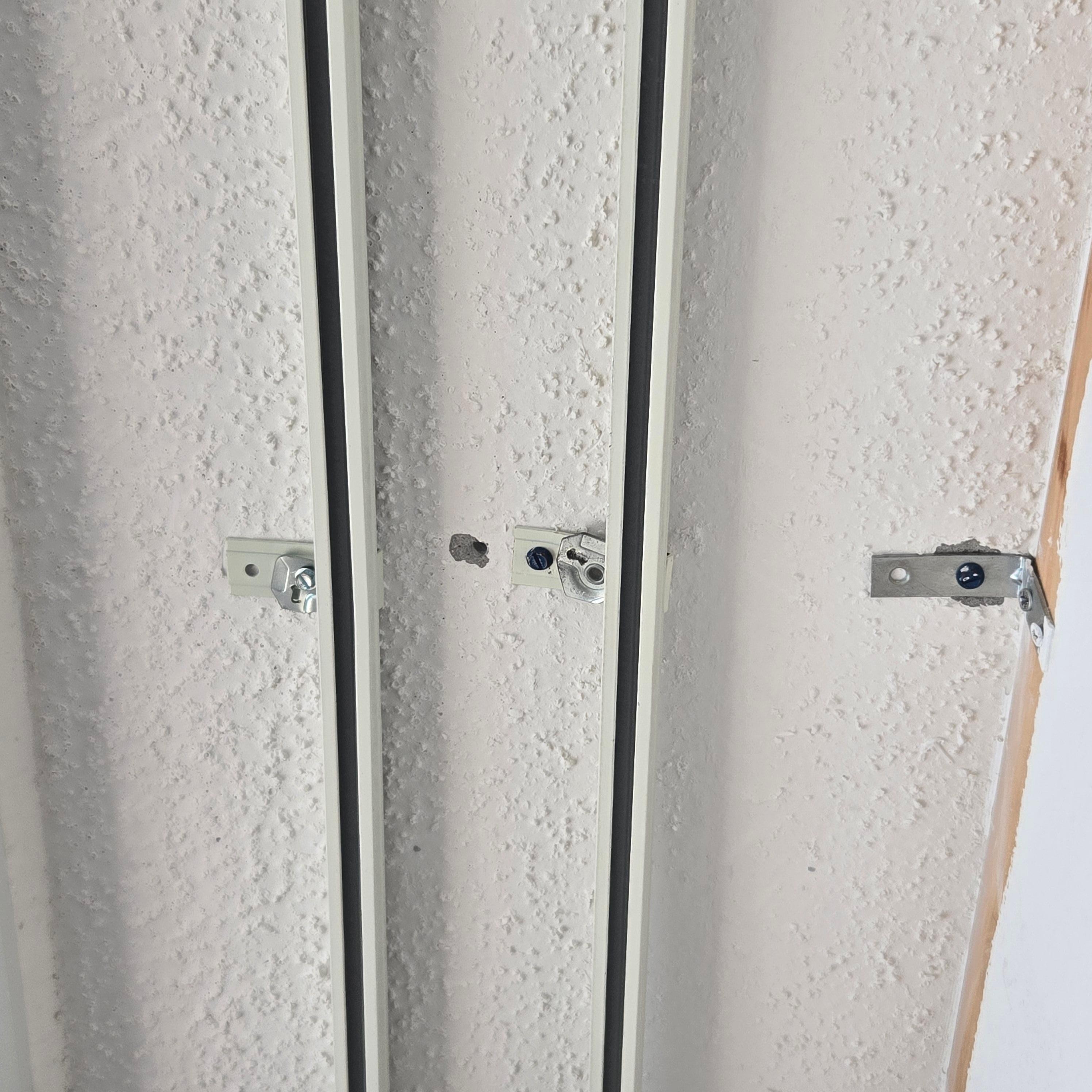 Curtain rod missing a screw which is why it fell.