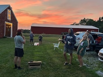 Corn hole at sunset.