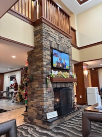 Gas fireplace and tv in the lobby.